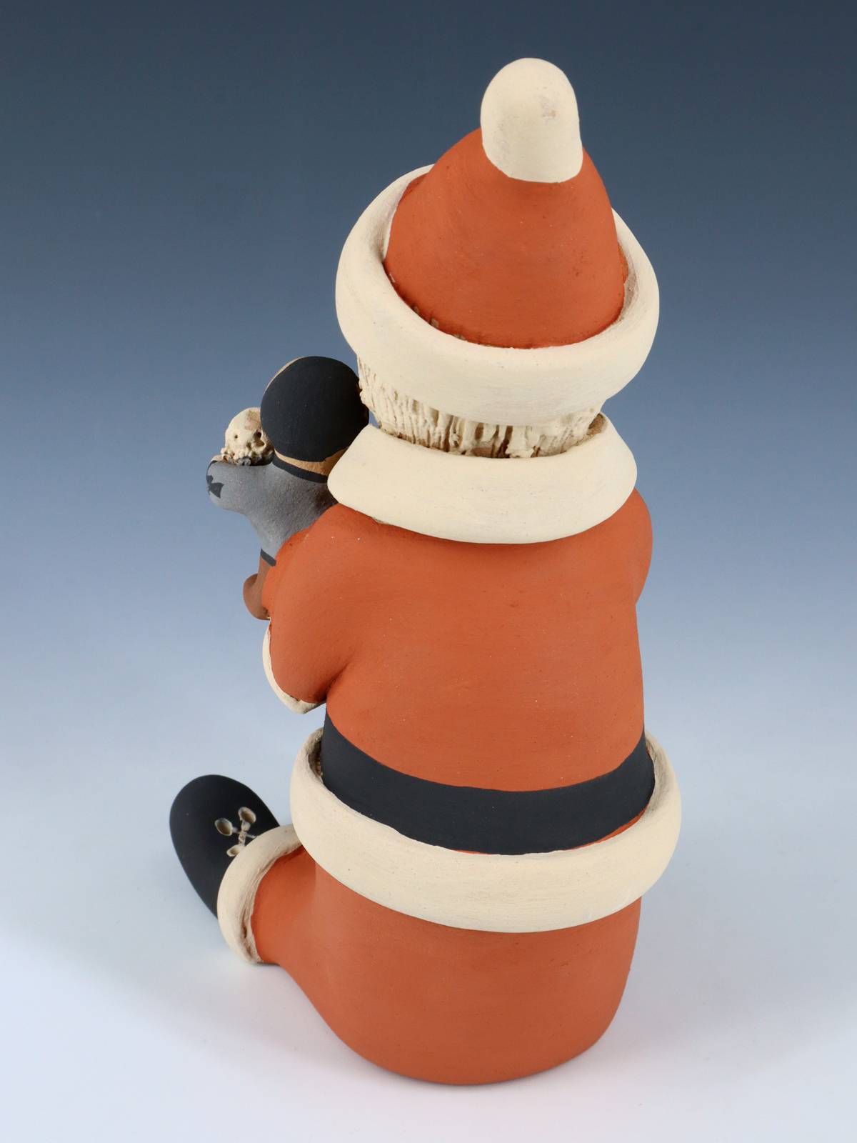 Jemez Pueblo Pottery Santa Claus Storyteller Figurine - PuebloDirect.com