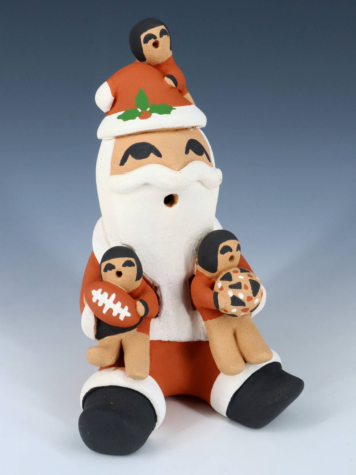 Jemez Pueblo Pottery Santa Claus Storyteller Figurine - PuebloDirect.com
