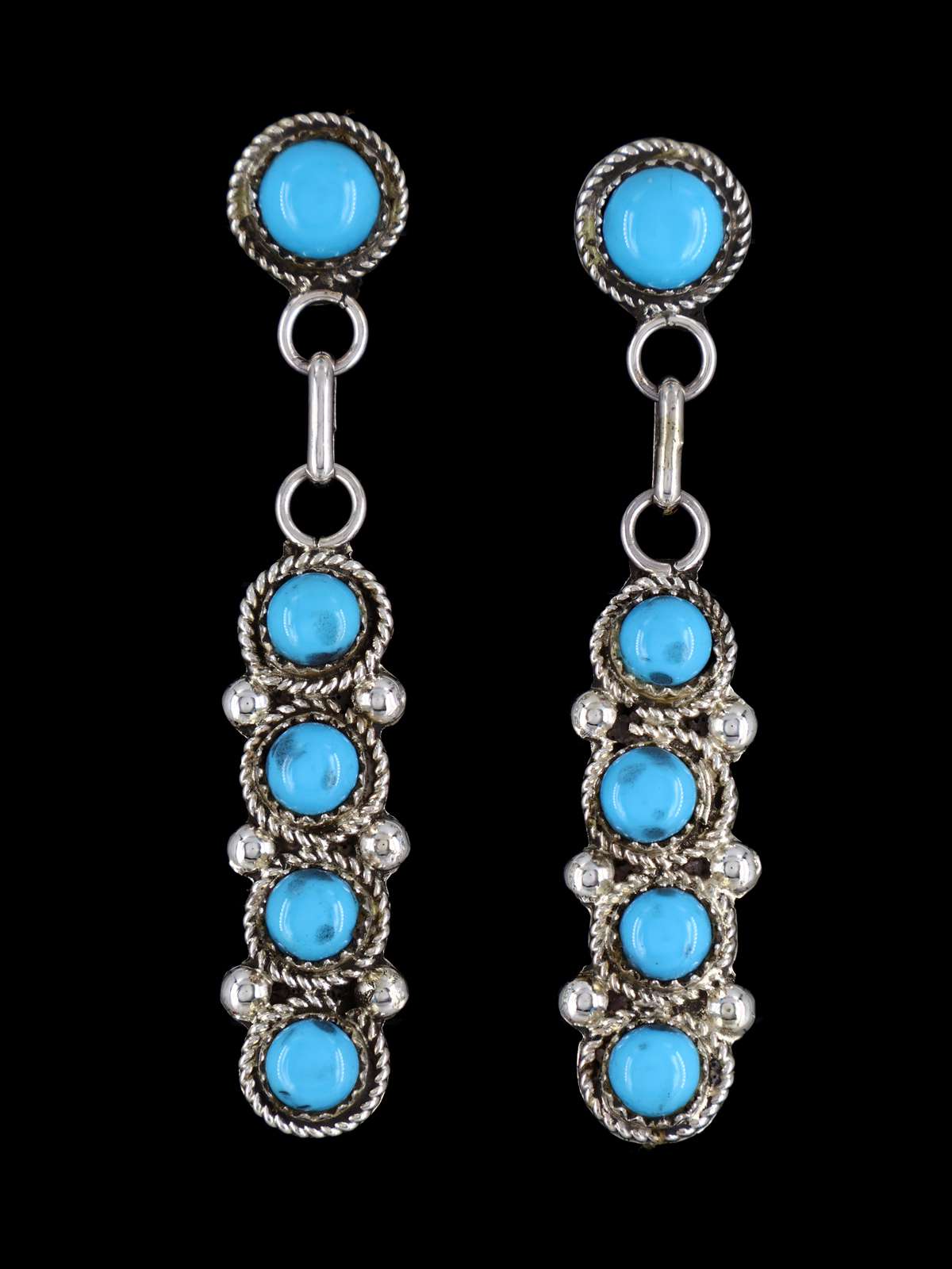 Pendientes con forma de poste de cara de sol con incrustaciones Zuni de nácar