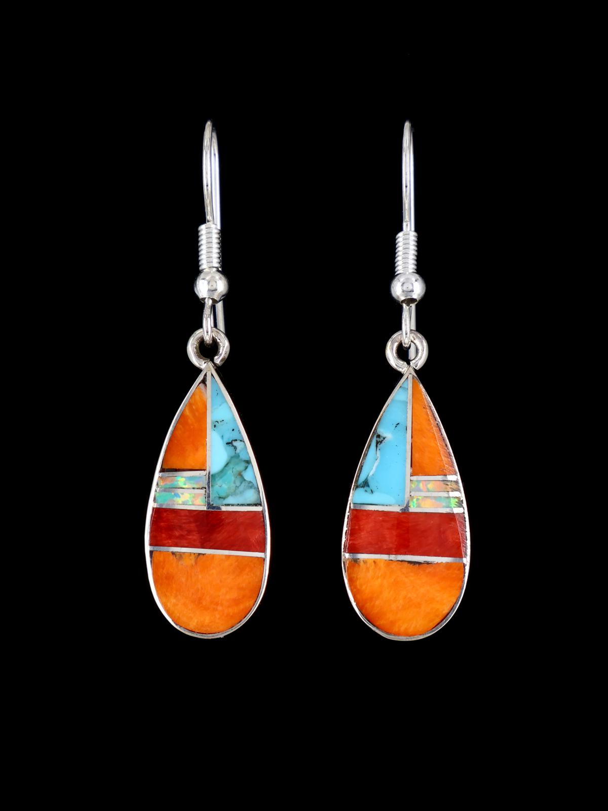 Boucles d'oreilles incrustées de plusieurs pierres en argent sterling