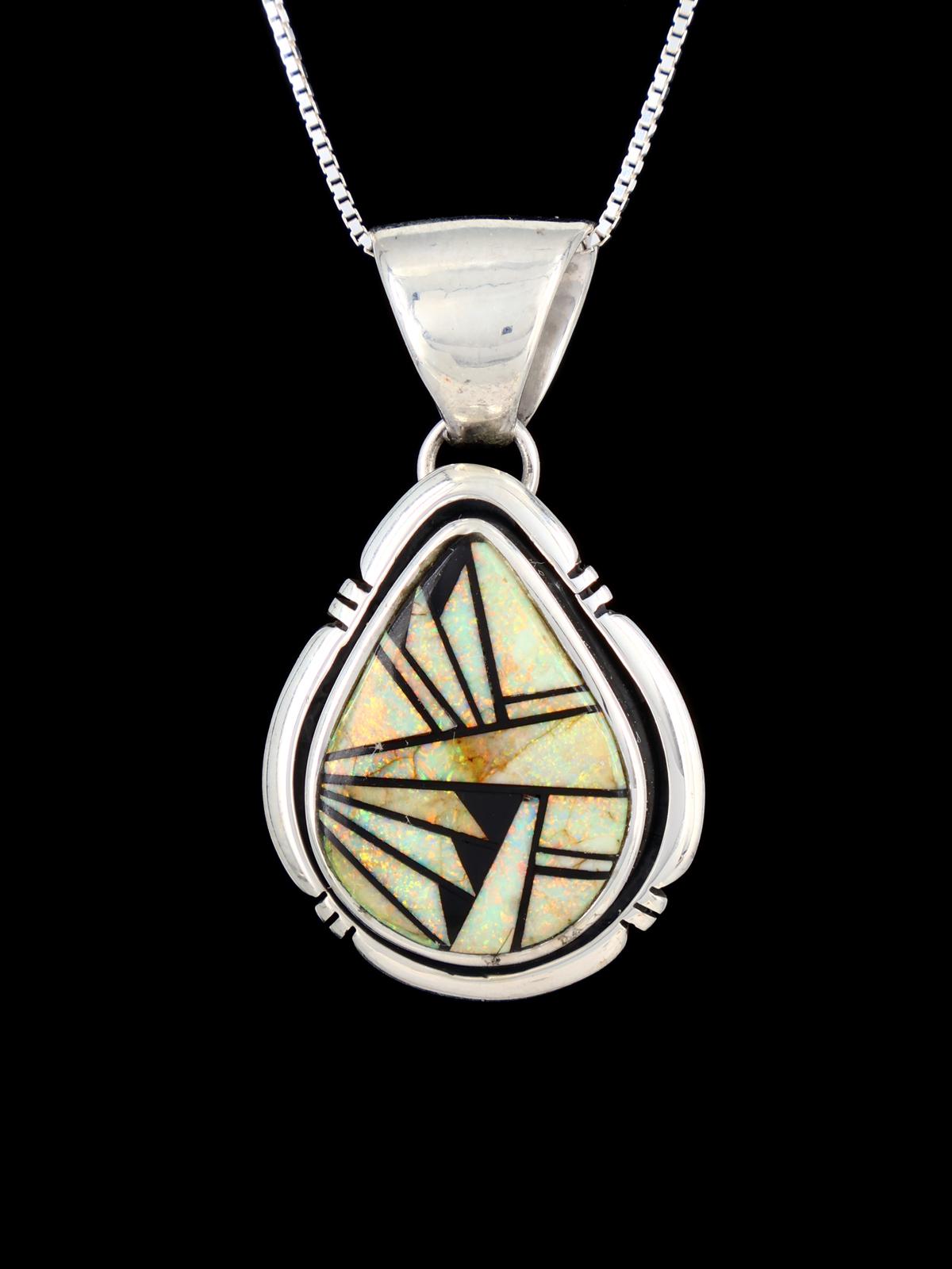 Pendentif croix incrusté de pierres multiples Navajo