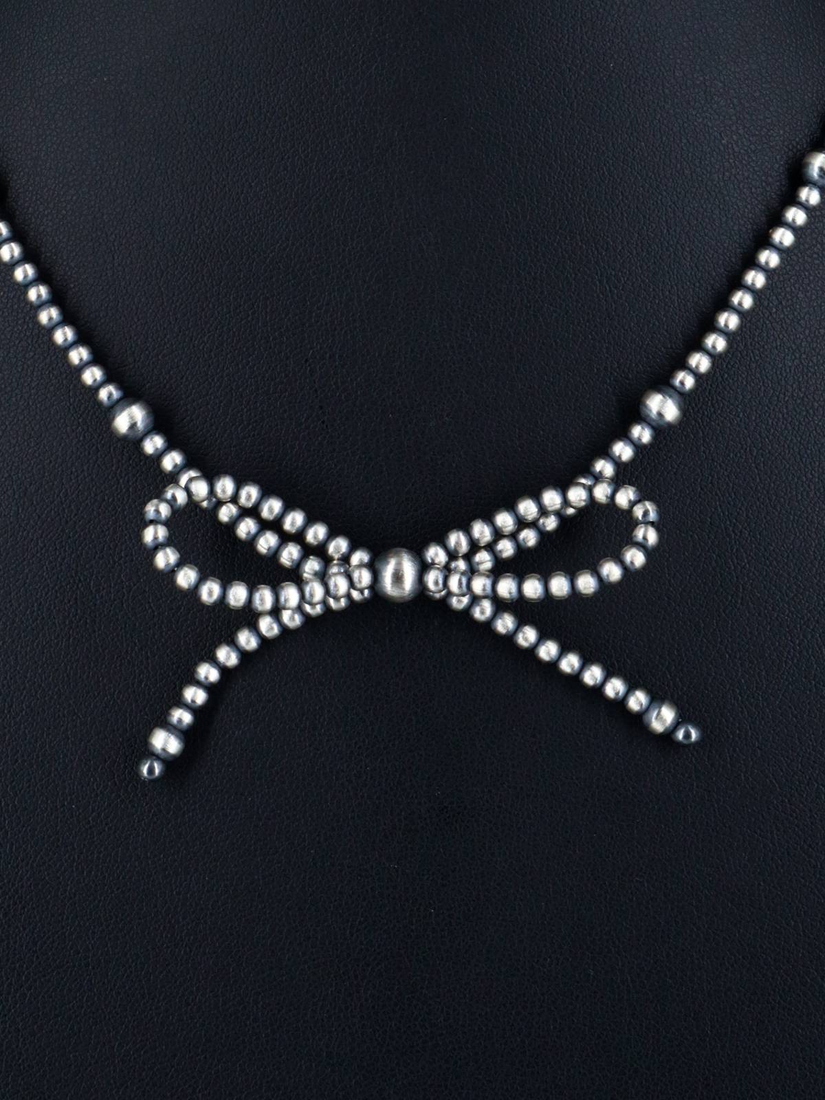Navajo Jewelry Single Strand Sterling Silver Bow Beaded Necklace - PuebloDirect.com