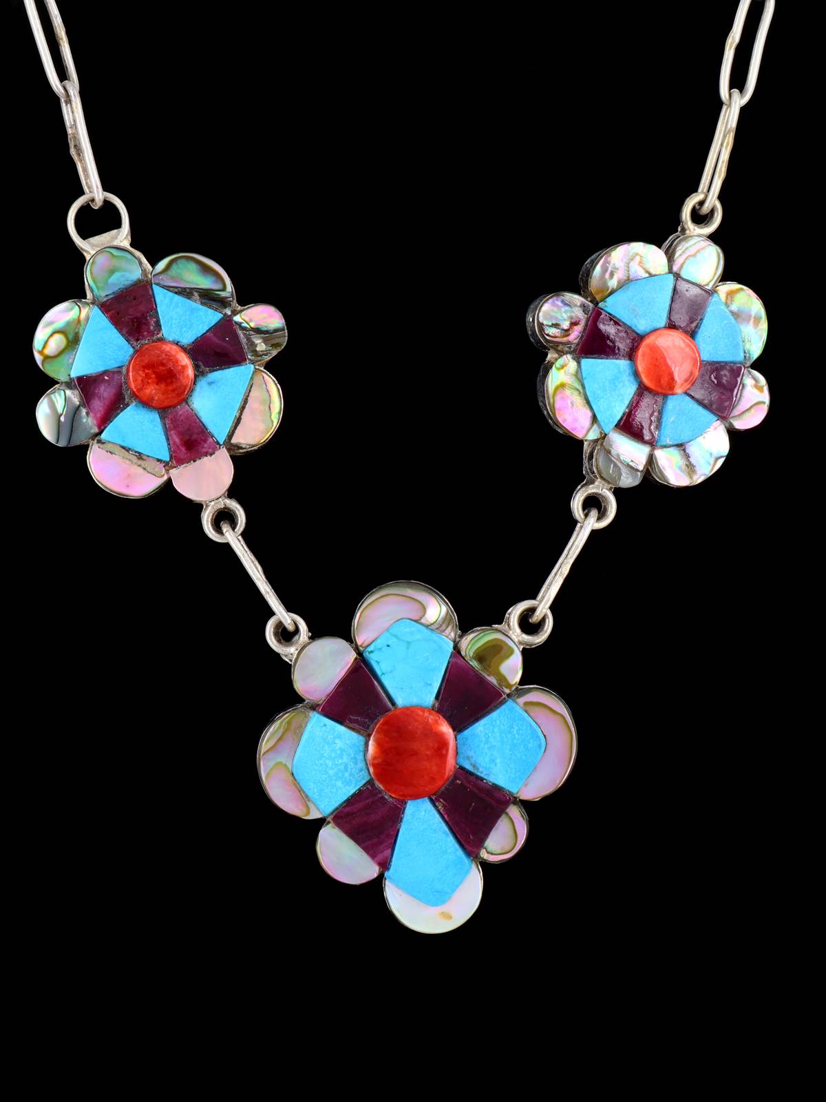 Colgante Zuni Thunderbird de plata de ley con varias piedras