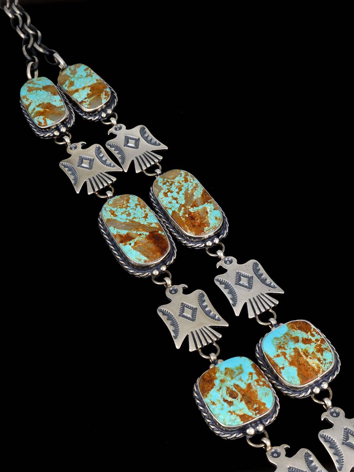 Juego de aretes y collar con forma de lazo de plata de ley con rodocrosita de nativos americanos