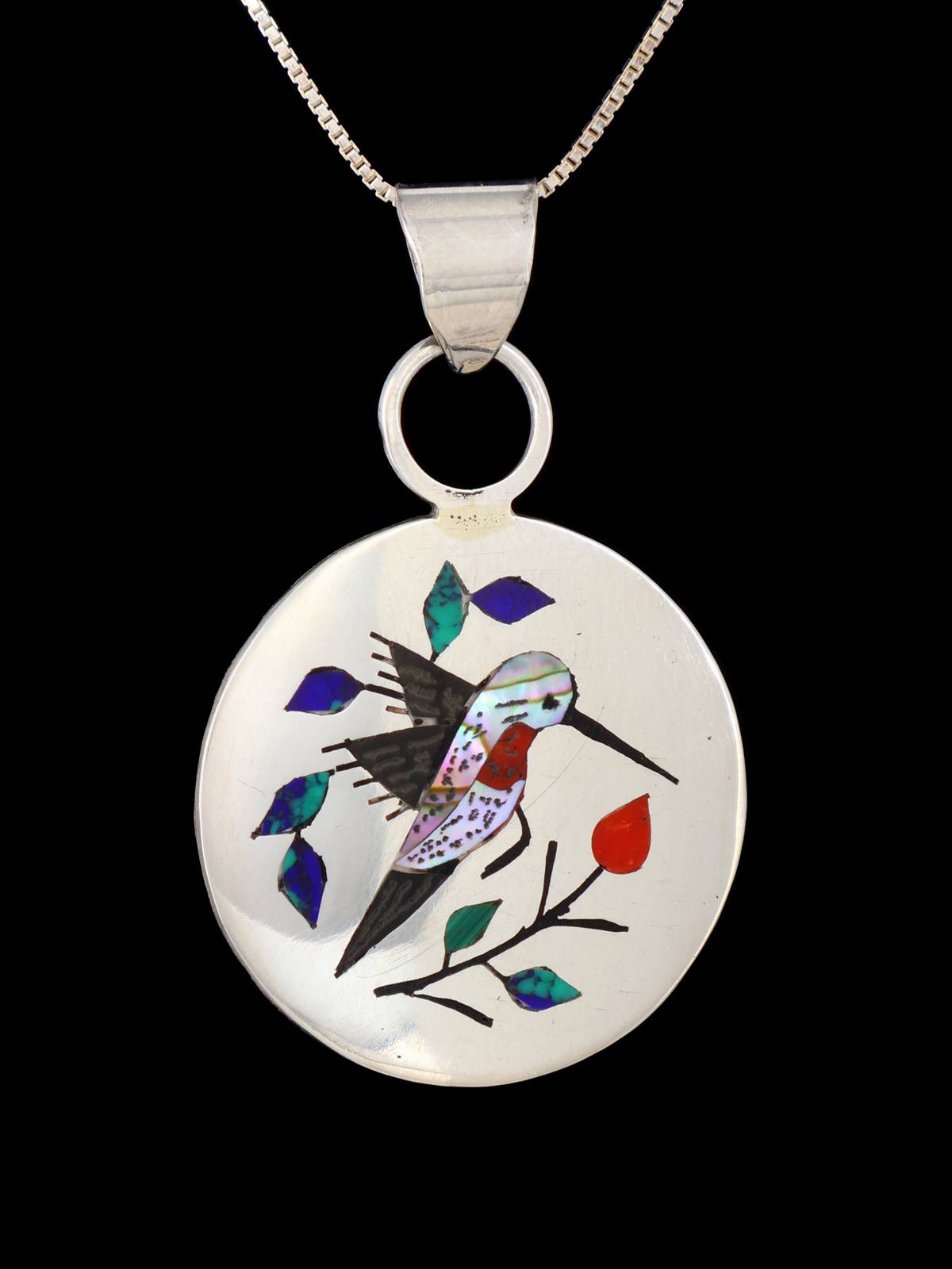 Pendentif oiseau incrusté de bijoux amérindiens