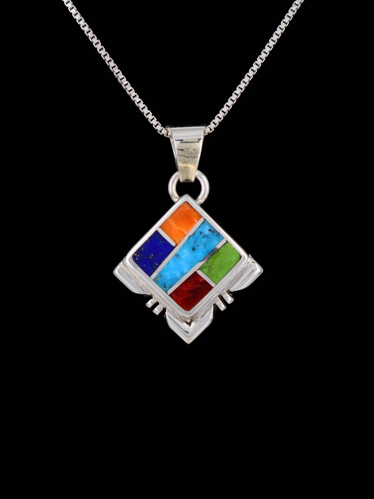Colgante de plata de ley con incrustaciones navajo de turquesa y ostra espinosa