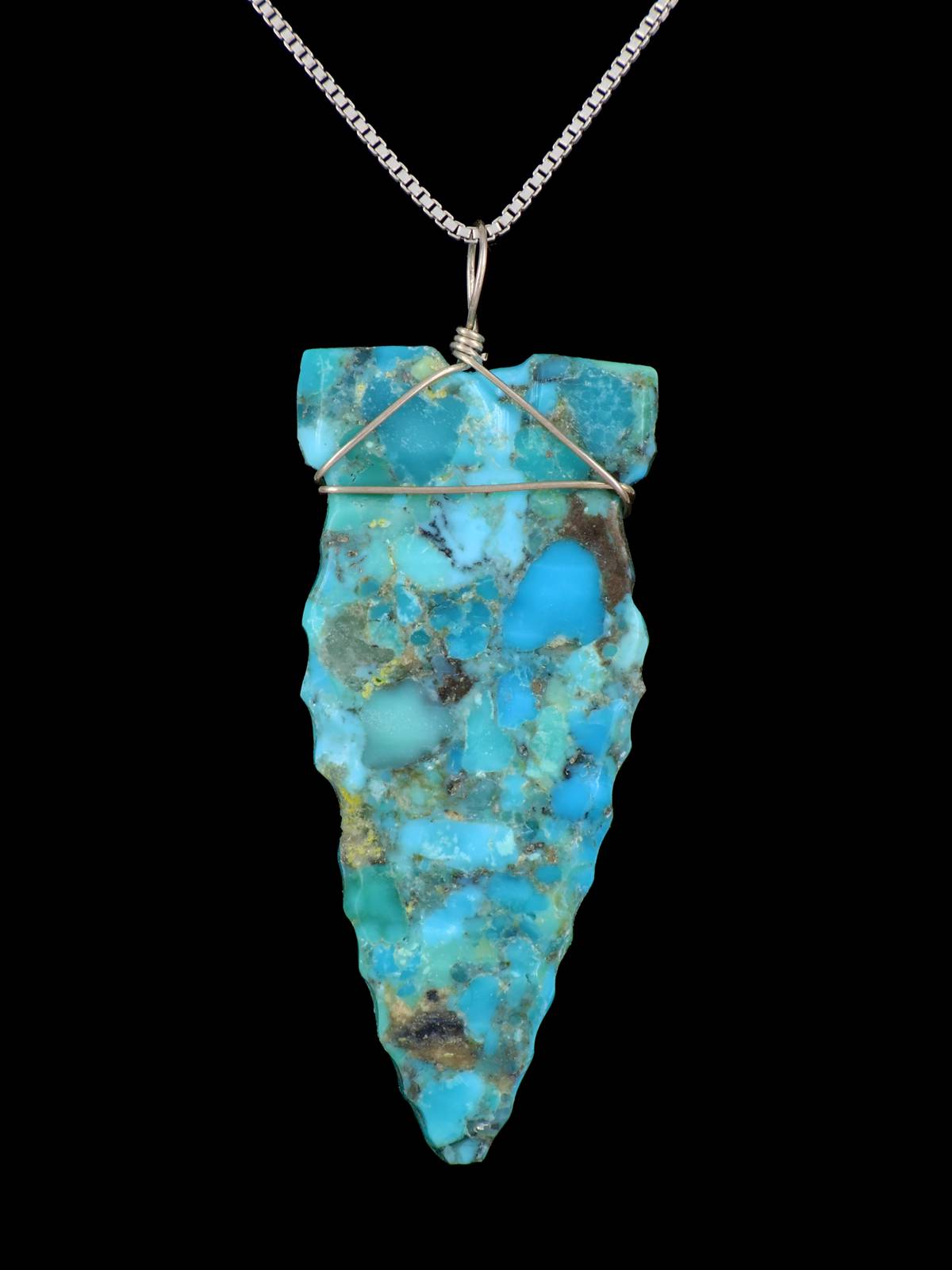 Colgante de punta de flecha turquesa de plata de ley navajo