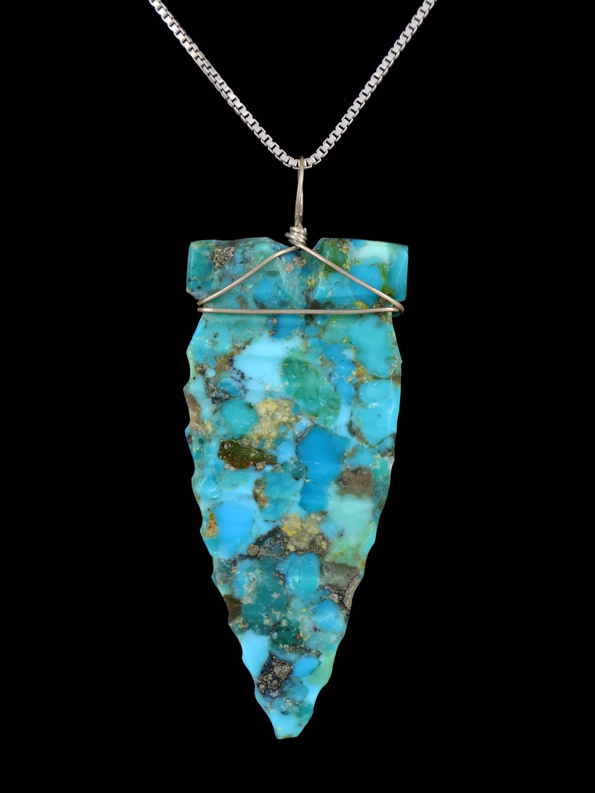 Colgante de punta de flecha turquesa de plata de ley navajo