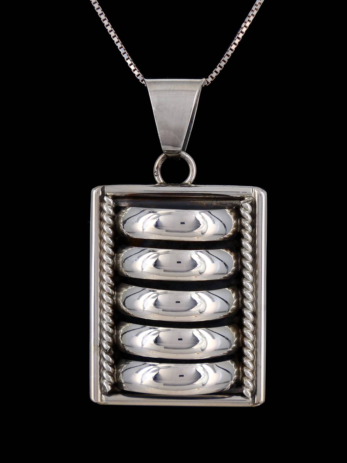 Épingle/pendentif en argent sterling sculpté Navajo
