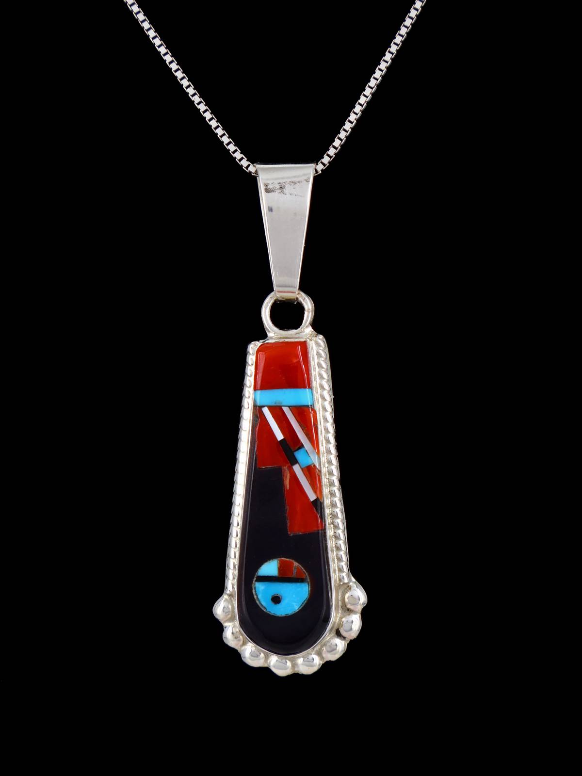 Colgante de plata de ley con incrustaciones de cara de sol Zuni de joyería nativa americana