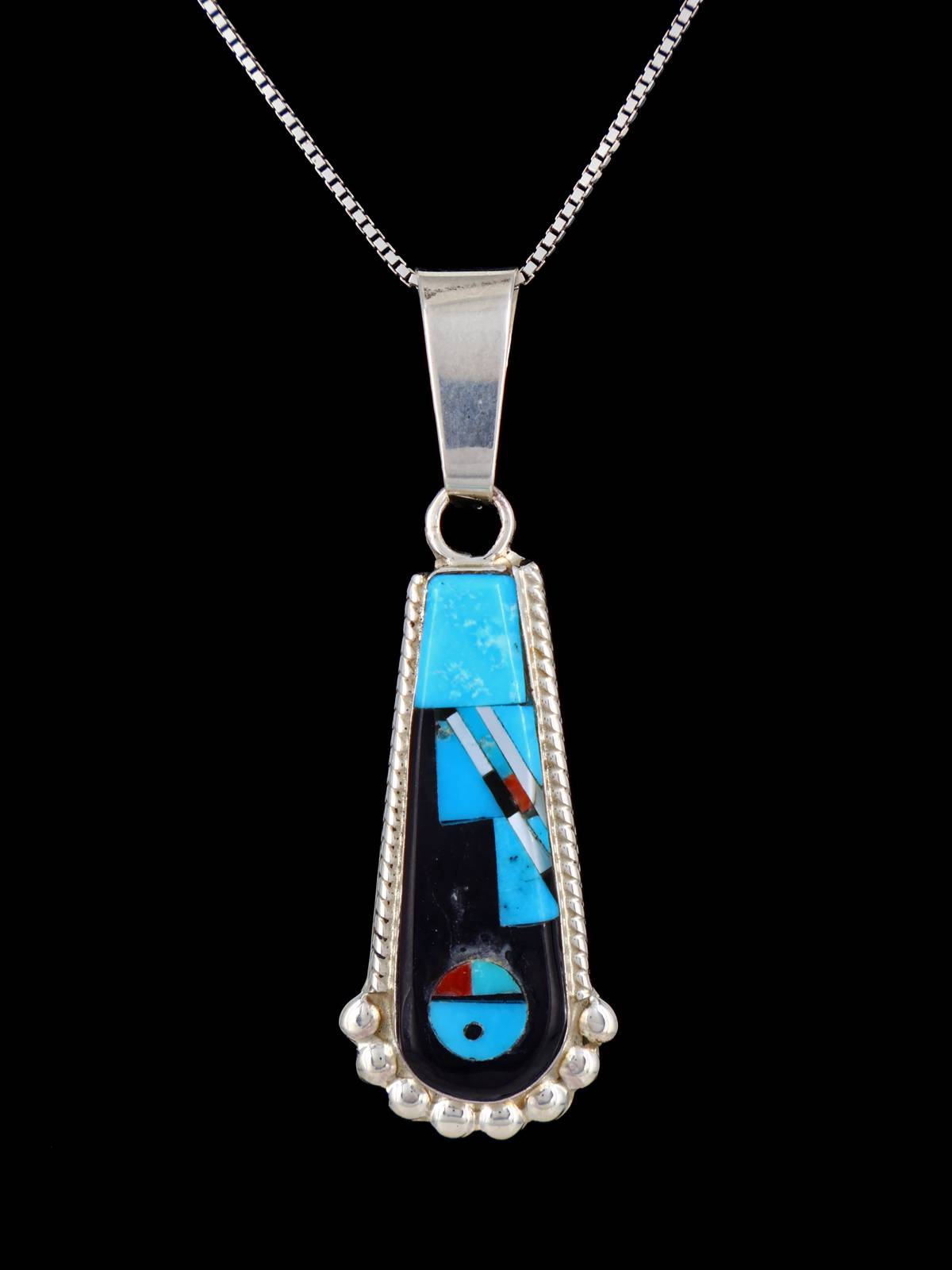Colgante de plata de ley con incrustaciones de cara de sol Zuni de joyería nativa americana