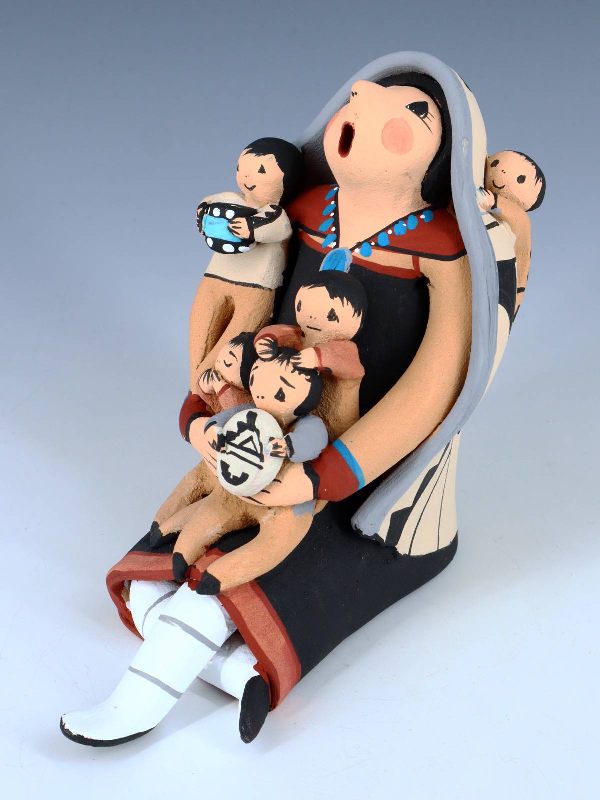 Jemez Pueblo Pottery Quatre bébés conteuse poupée