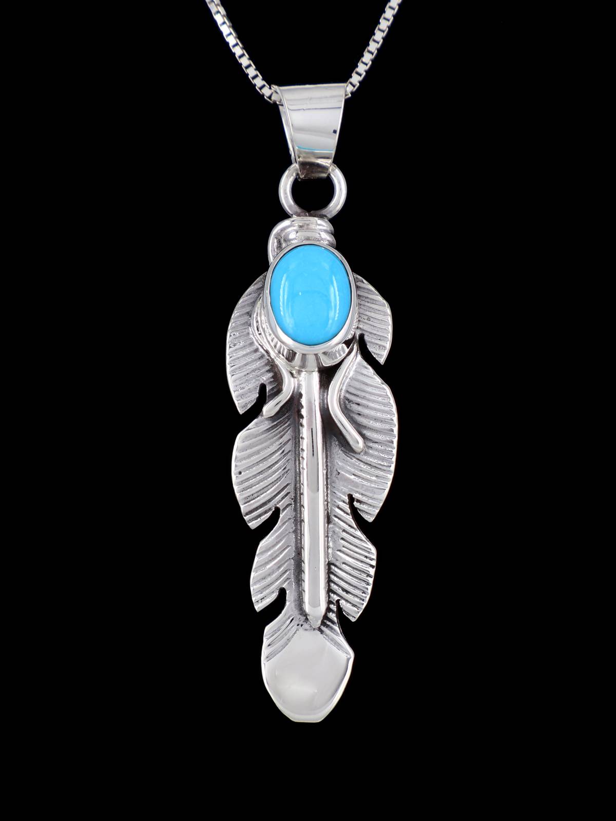 Navajo Crafted Sterling Silver Sleeping Beauty Turquoise Feather Pendant - PuebloDirect.com
