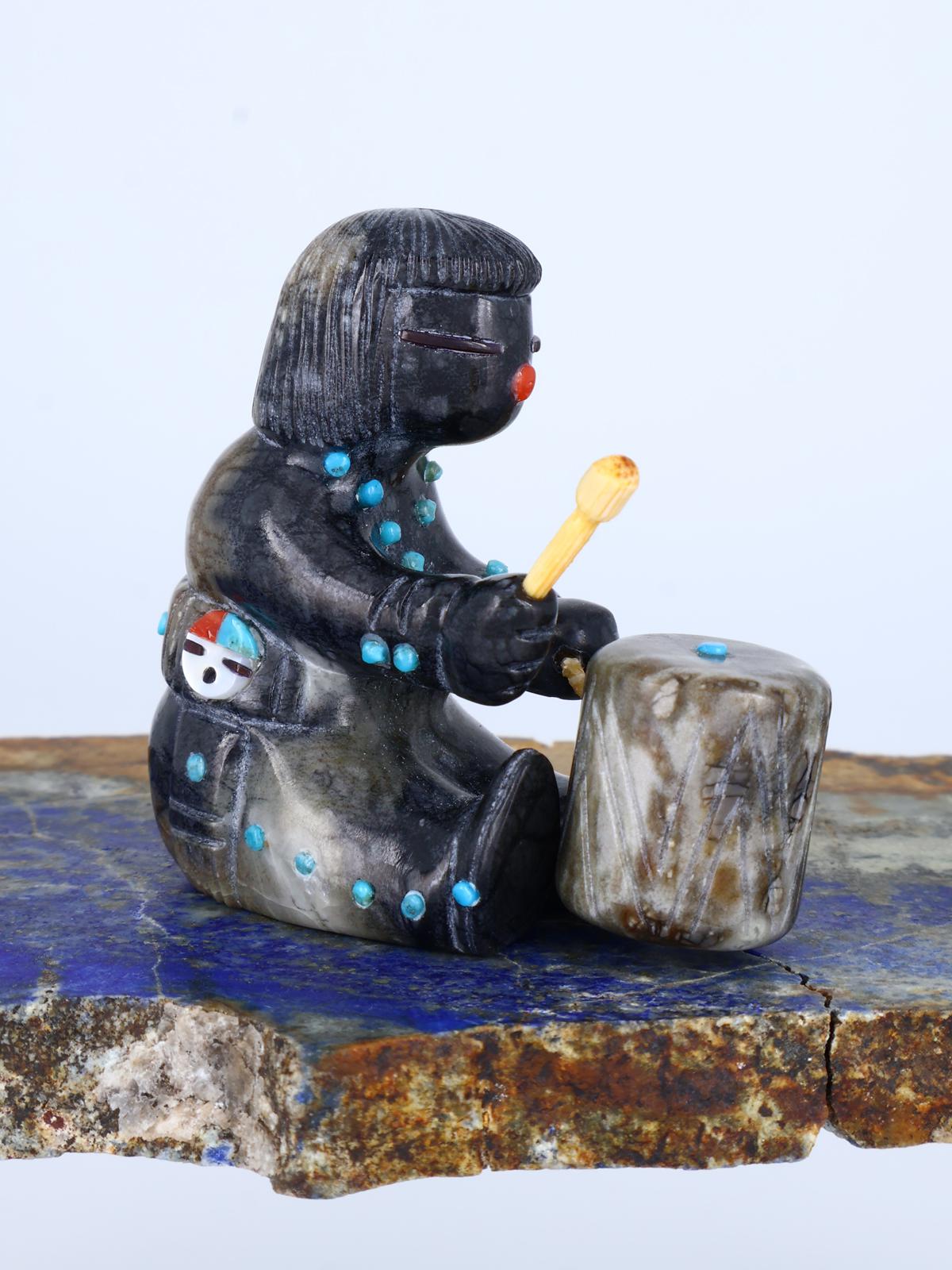 Serpentine baterista Zuni Fetiche