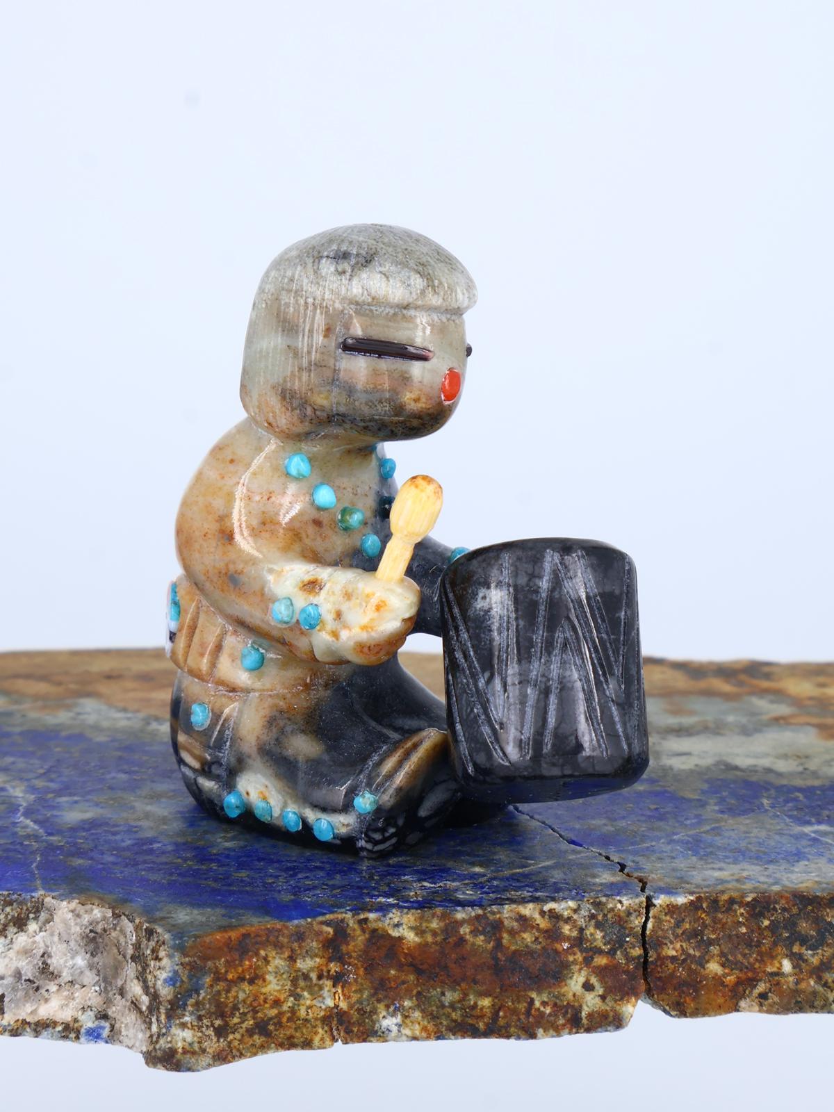 Serpentine baterista Zuni Fetiche