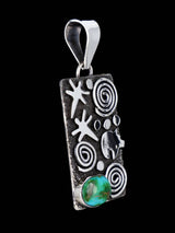 Navajo Sterling Silver Sonoran Gold Turquoise Petroglyph Pendant - PuebloDirect.com