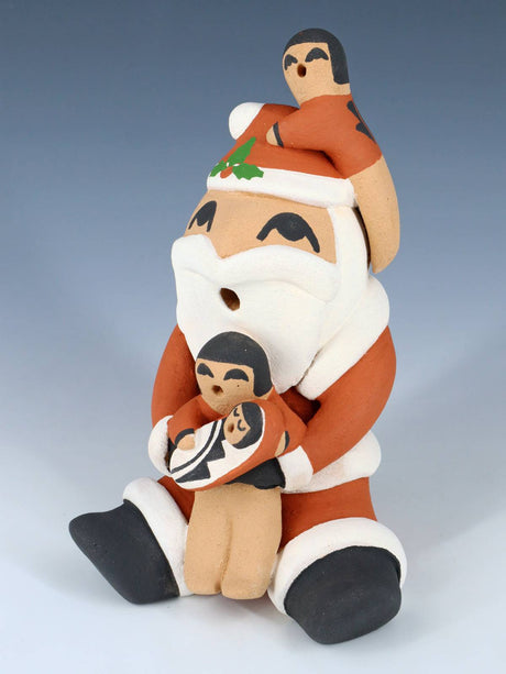 Jemez Pueblo Pottery Santa Claus Storyteller Figurine - PuebloDirect.com