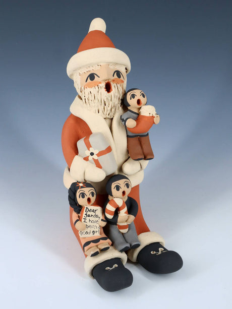 Jemez Pueblo Pottery Santa Claus Storyteller Figurine - PuebloDirect.com