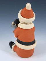 Jemez Pueblo Pottery Santa Claus Storyteller Figurine - PuebloDirect.com