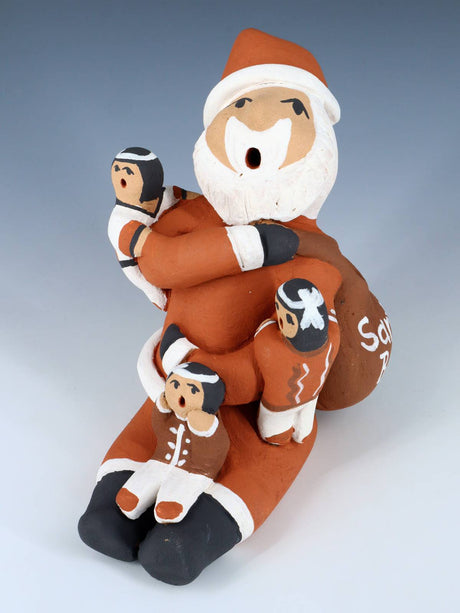 Jemez Pueblo Pottery Storytime Santa Claus Storyteller Doll - PuebloDirect.com