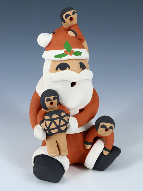 Jemez Pueblo Pottery Santa Claus Storyteller Figurine - PuebloDirect.com