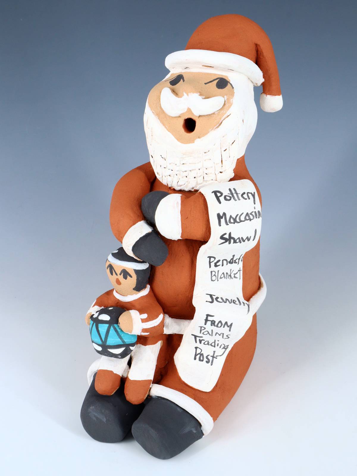 Jemez Pueblo Pottery Santa Claus Storyteller Doll - PuebloDirect.com