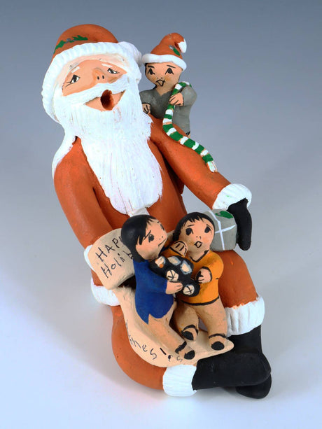 Jemez Pueblo Pottery Three Baby Santa Claus Storyteller - PuebloDirect.com