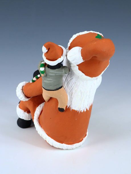 Jemez Pueblo Pottery Three Baby Santa Claus Storyteller - PuebloDirect.com