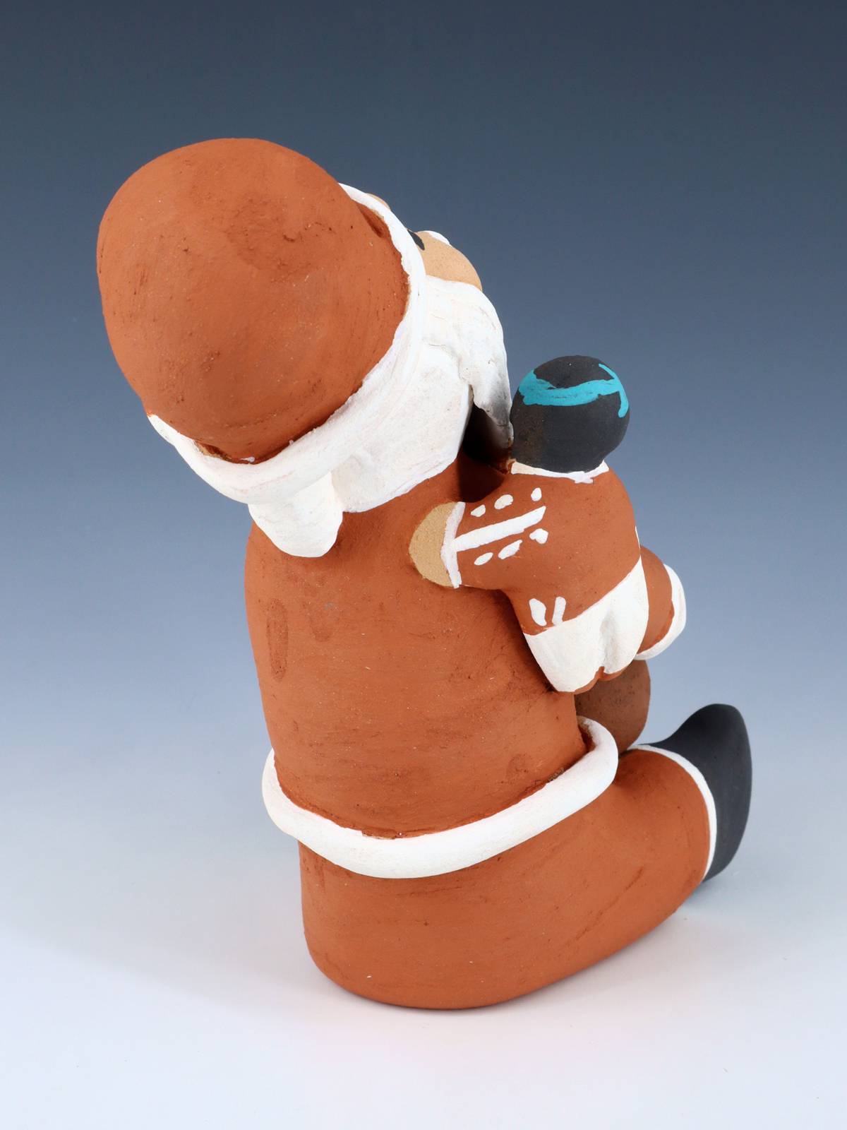 Jemez Pueblo Pottery Santa Claus Storyteller Doll - PuebloDirect.com