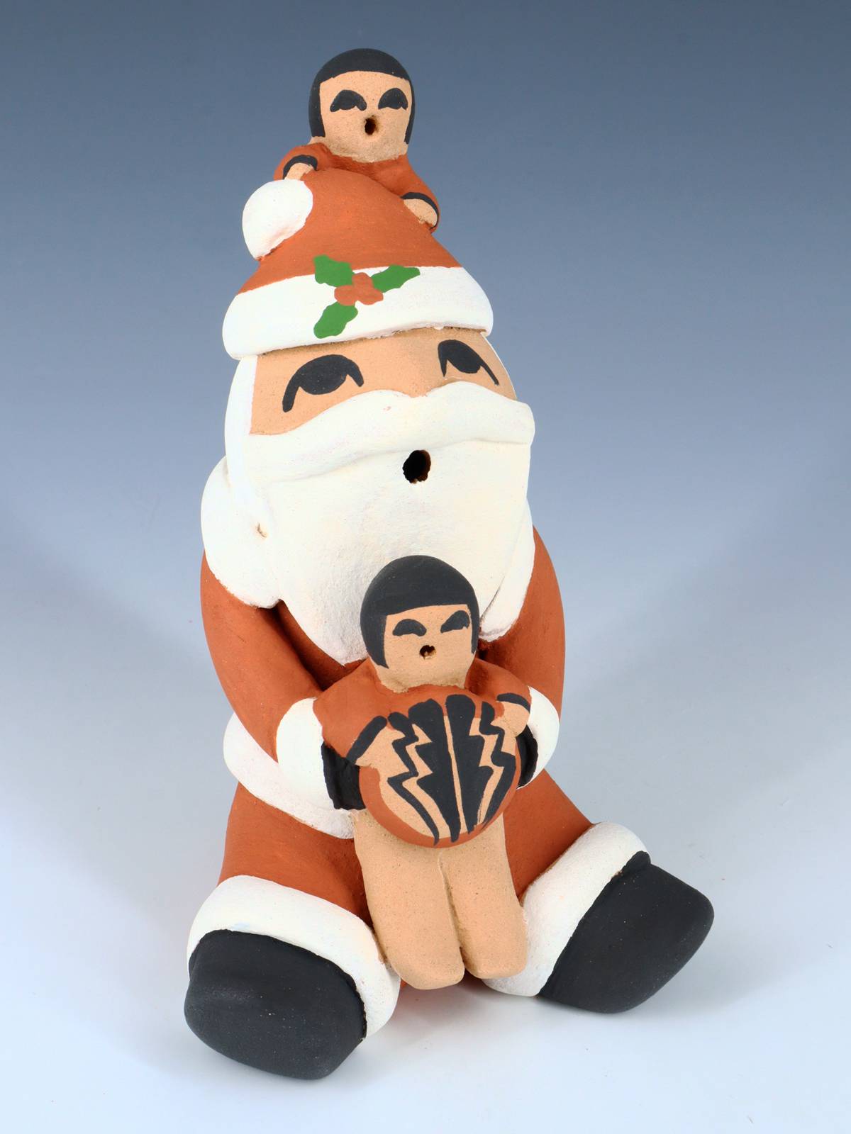 Jemez Pueblo Pottery Santa Claus Storyteller Figurine - PuebloDirect.com