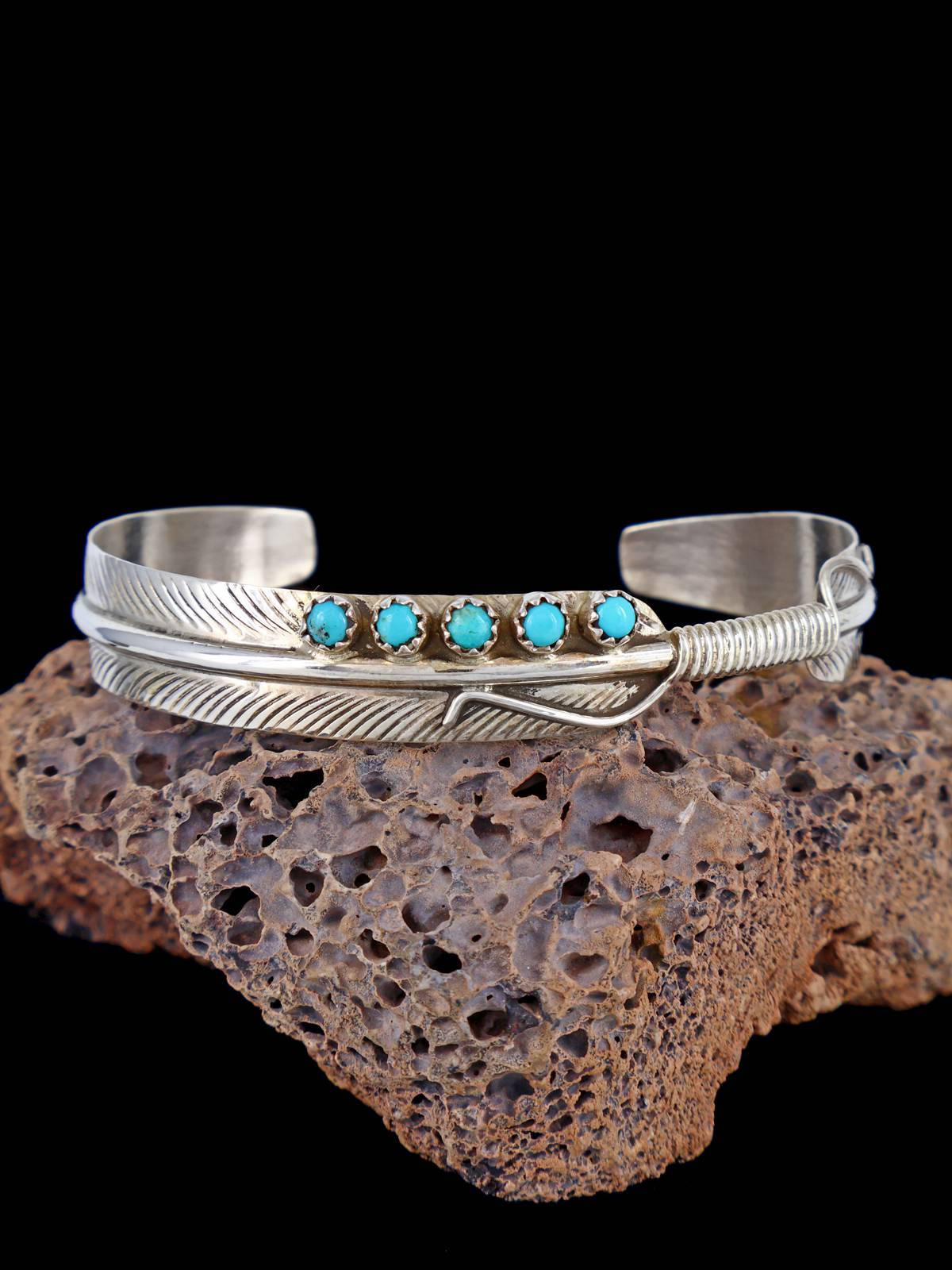Pulsera de puño de plumas turquesa de plata de ley navajo