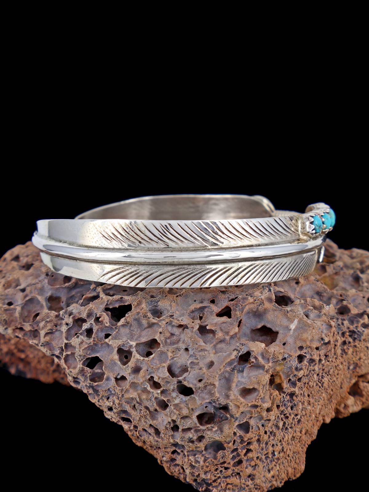 Pulsera de puño de plumas turquesa de plata de ley navajo