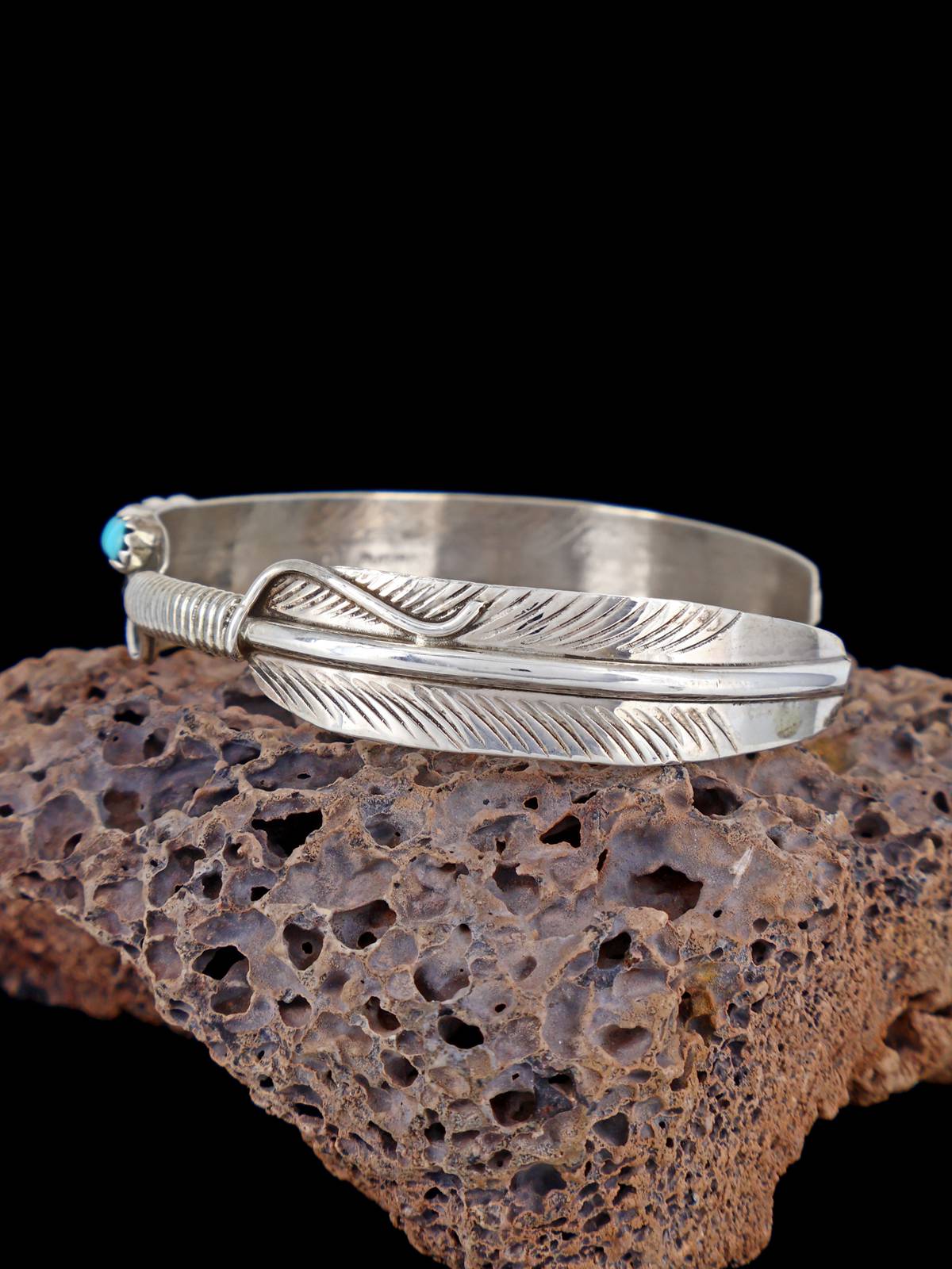 Pulsera de puño de plumas turquesa de plata de ley navajo
