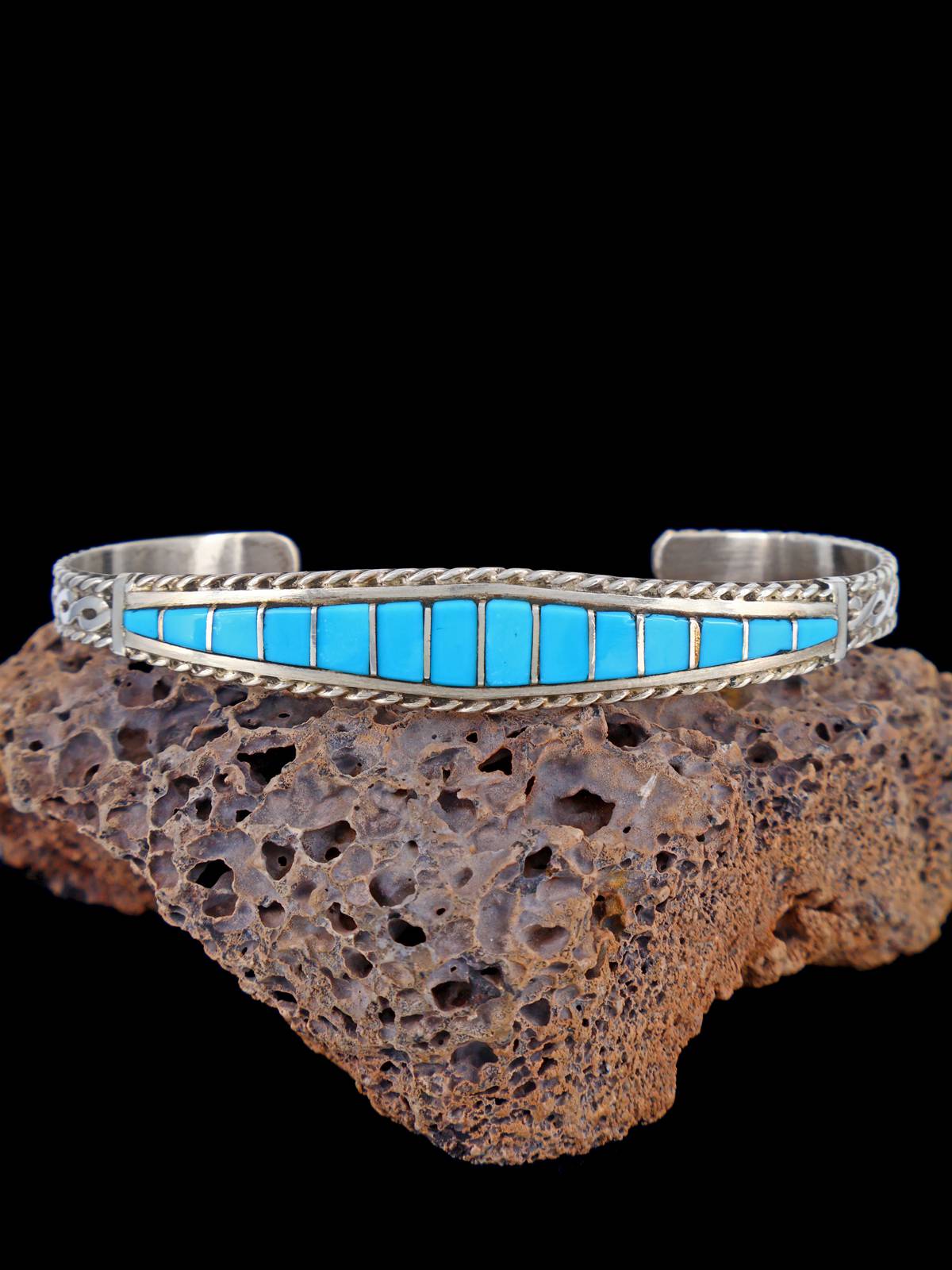Pulsera con incrustaciones Zuni de ónix y plata de ley