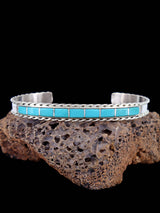 Pulsera con incrustaciones Zuni de ónix y plata de ley