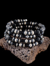 Pulsera envolvente con cuentas de ónix negro y plata de ley