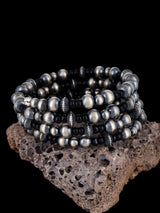 Pulsera envolvente con cuentas de ónix negro y plata de ley