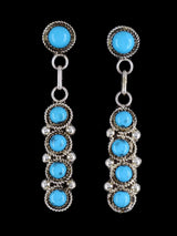 Pendientes con forma de poste de cara de sol con incrustaciones Zuni de nácar