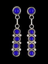 Pendientes con forma de poste de cara de sol con incrustaciones Zuni de nácar