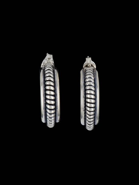 Boucles d’oreilles pendantes en cuivre estampillé Navajo