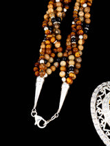 Collar con colgante de oso reversible con incrustaciones de búfalo blanco navajo