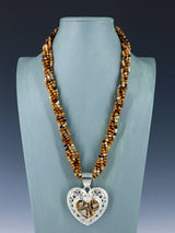 Collar con colgante de oso reversible con incrustaciones de búfalo blanco navajo
