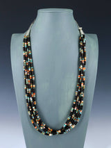 Collier amérindien de corail de pomme et de lapis