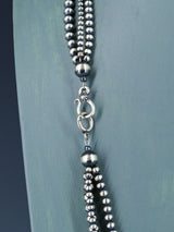 Collar con cuentas de plata de ley de triple hebra de 24"