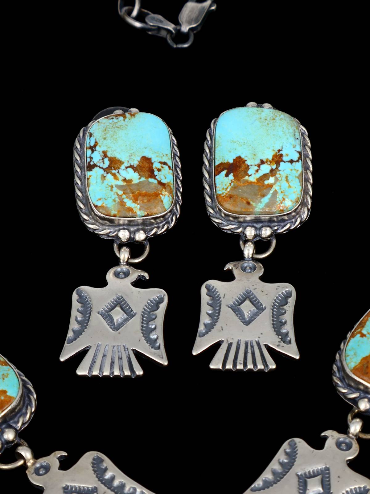 Juego de aretes y collar con forma de lazo de plata de ley con rodocrosita de nativos americanos