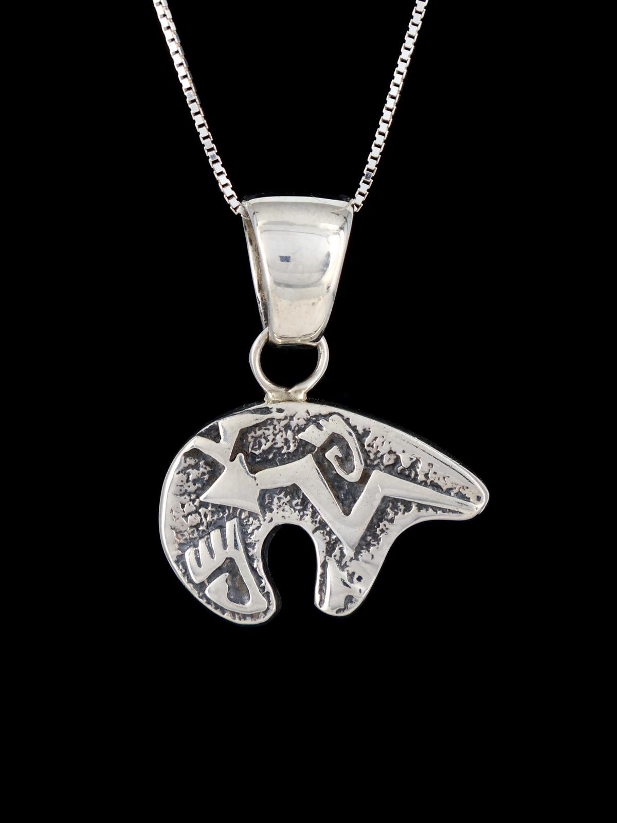 Navajo Sterling Silver Reversible Turquoise Inlay Bear Pendant - PuebloDirect.com