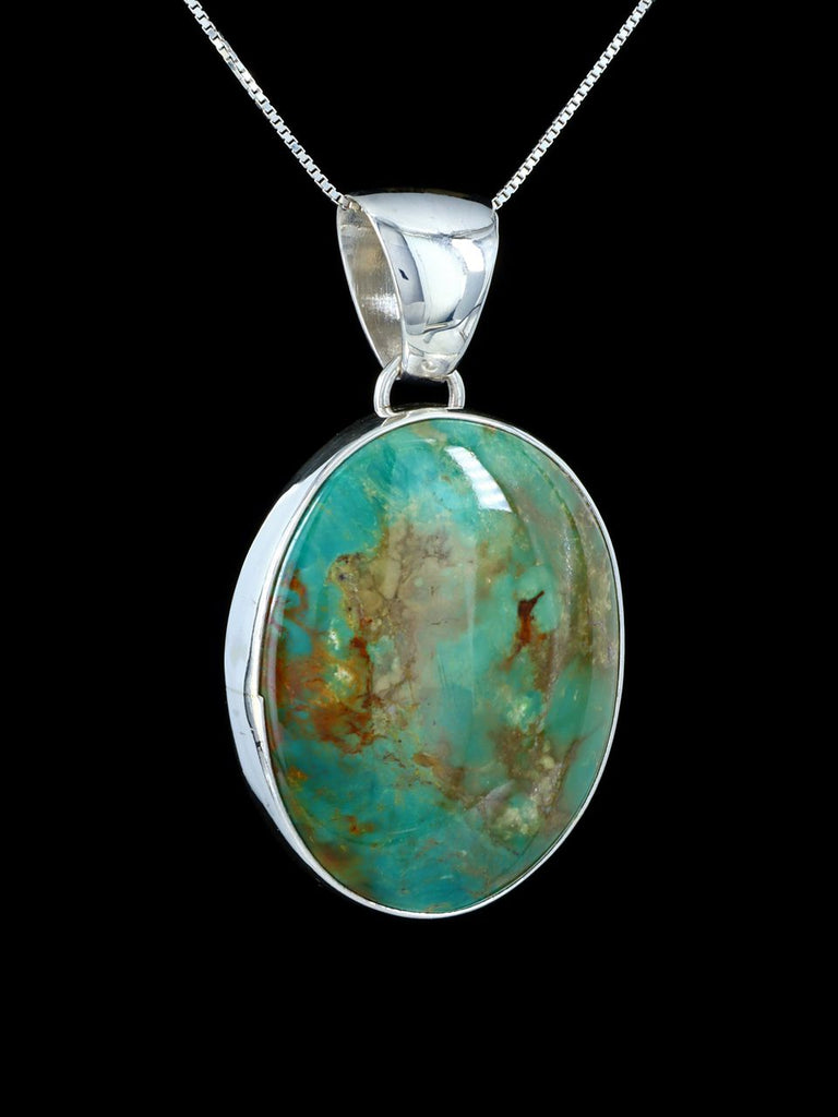 Navajo Jewelry Sterling Silver Tyrone Turquoise Pendant - PuebloDirect.com
