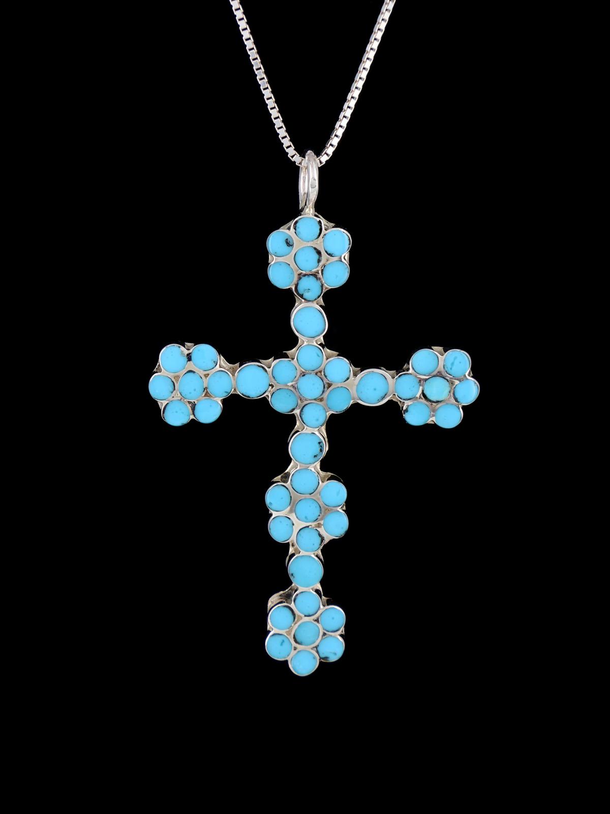 Colgante de plata de ley con forma de cruz de color turquesa con incrustaciones Zuni