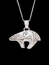Navajo Sterling Silver Reversible Pink Conch Inlay Bear Pendant - PuebloDirect.com