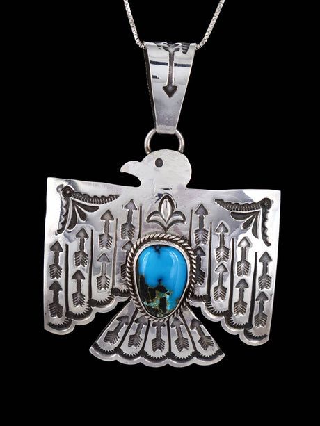 Navajo Sterling Silver Turquoise Thunderbird Pendant - PuebloDirect.com
